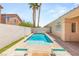 Relaxing pool area featuring lounge chairs and palm trees, perfect for outdoor enjoyment at 9688 Meeks Bay Ave, Las Vegas, NV 89148