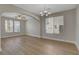 Open dining area with wood floors, neutral walls, and a large window at 981 Buffalo River Ave, Henderson, NV 89002