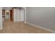 Living room featuring tile floors, neutral walls, arches and an entryway at 981 Buffalo River Ave, Henderson, NV 89002