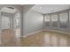 Living room featuring tile floors, neutral walls, arches and an entryway at 981 Buffalo River Ave, Henderson, NV 89002