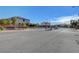Street view of the community entrance showing the gate and Boulder Creek signage at 981 Buffalo River Ave, Henderson, NV 89002