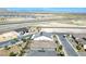 Aerial view of a desert neighborhood with new construction homes and distant mountain views at 10049 Cardinal Knoll Ave, Las Vegas, NV 89143