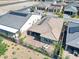 Overhead view showcasing modern house design with desert landscape, paved patio, and fenced yard at 10049 Cardinal Knoll Ave, Las Vegas, NV 89143