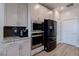 Stylish kitchen with stainless steel appliances, including microwave, oven, and refrigerator at 10049 Cardinal Knoll Ave, Las Vegas, NV 89143