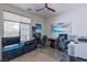 Well-lit office boasts dual workstations, modern decor, and bright windows at 10049 Cardinal Knoll Ave, Las Vegas, NV 89143