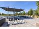 Outdoor recreation area featuring chess, comfortable seating, and shade perfect for gathering and relaxing at 10049 Cardinal Knoll Ave, Las Vegas, NV 89143