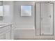 Modern bathroom boasting a sleek glass shower and soaking tub at 10735 Galveston Bay St, Las Vegas, NV 89179