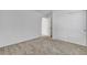 Simple bedroom with carpet and an adjacent closet with sliding doors at 10735 Galveston Bay St, Las Vegas, NV 89179