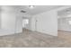 Bright carpeted bedroom with access to the en suite bathroom and staircase at 10735 Galveston Bay St, Las Vegas, NV 89179