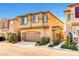Beautiful two-story home with desert landscaping, a two-car garage and shuttered windows at 10735 Galveston Bay St, Las Vegas, NV 89179