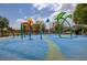 Community splash pad featuring colorful structures and a whimsical design for Gathering fun at 10735 Galveston Bay St, Las Vegas, NV 89179