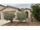 Charming single-story home with desert landscaping, covered entry, and attached two-car garage at 10780 Valencia Hills St, Las Vegas, NV 89141