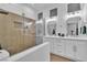 Modern bathroom featuring double sinks, a large shower, and sleek fixtures at 10801 Clarion Ln, Las Vegas, NV 89134