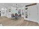 Elegant dining room featuring a modern chandelier and neutral decor at 10801 Clarion Ln, Las Vegas, NV 89134