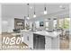 Bright kitchen featuring white cabinets, modern lighting, and stainless steel appliances at 10801 Clarion Ln, Las Vegas, NV 89134