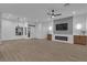 Spacious living room with modern fireplace and entertainment center at 10801 Clarion Ln, Las Vegas, NV 89134
