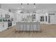 Bright, open concept home featuring barstool seating and modern finishes at 10801 Clarion Ln, Las Vegas, NV 89134