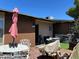 Charming front entry with lovely outdoor seating, desert landscaping, and a welcoming, relaxed ambiance at 111 E Van Wagenen St, Henderson, NV 89015