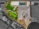 Drone image shows a gorgeous backyard featuring a pool, manicured lawn, and elegant patio area at 11238 Rebel Dome Ct, Las Vegas, NV 89141