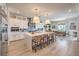 Bright kitchen features a large center island with seating and stylish pendant lighting at 11238 Rebel Dome Ct, Las Vegas, NV 89141