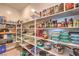 Well-organized walk-in pantry with shelving, ideal for storage at 11238 Rebel Dome Ct, Las Vegas, NV 89141