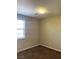 This bedroom is brightly lit by a large window and recessed lighting, offering a clean and neutral space at 12243 Pacific Cruise Ave, Las Vegas, NV 89138