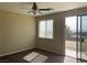Bedroom with a sliding glass door to balcony offering community views at 12243 Pacific Cruise Ave, Las Vegas, NV 89138