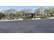 Neighborhood park featuring a covered picnic area and mature trees at 12243 Pacific Cruise Ave, Las Vegas, NV 89138