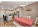 Charming dining area adjacent to the kitchen, featuring a cozy table and stylish light fixture at 1610 Dire Wolf Avenue, North Las Vegas, NV 89084