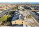 Aerial view showcasing the home's roof, solar panels, and the surrounding neighborhood at 1610 Dire Wolf Avenue, North Las Vegas, NV 89084