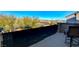 Outdoor patio with view of other homes and blue sky at 1610 Dire Wolf Avenue, North Las Vegas, NV 89084