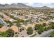 Aerial view showcasing the Sun City Summerlin neighborhood with mountain views at 1904 Bellview St, Las Vegas, NV 89134