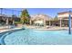 Resort-style community pool with sun loungers and mountain views at 1904 Bellview St, Las Vegas, NV 89134