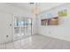 Dining room with tile flooring, glass door, and chandelier at 1904 Bellview St, Las Vegas, NV 89134