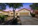 Charming single-story home with desert landscaping, two car garage and beautiful curb appeal at 1904 Bellview St, Las Vegas, NV 89134