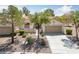 Charming single-story home featuring a well-maintained front yard and two-car garage at 1904 Bellview St, Las Vegas, NV 89134