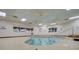 Relaxing indoor pool features shallow water, tile, and easy access handrail at 1904 Bellview St, Las Vegas, NV 89134