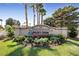 Beautiful Palm Valley Golf Club sign with colorful flowers and manicured lawn at 1904 Bellview St, Las Vegas, NV 89134