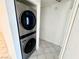 Conveniently located stacked washer and dryer unit with tile floor in laundry area at 2064 Mesquite Ln # 102, Laughlin, NV 89029