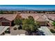 High-angle view of a single-Gathering home with tile roof, front yard landscaping, and community neighborhood at 2183 Waterton Rivers Dr, Henderson, NV 89044
