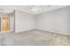 Expansive bedroom features neutral carpet, ceiling fan, and natural light at 2183 Waterton Rivers Dr, Henderson, NV 89044