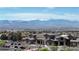 Community clubhouse with stunning views of the mountains in the background at 2183 Waterton Rivers Dr, Henderson, NV 89044