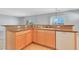 Open kitchen with granite countertops, stainless steel appliances and sink at 2183 Waterton Rivers Dr, Henderson, NV 89044