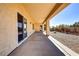 Covered patio offers a relaxing outdoor space with views of the backyard landscaping at 2183 Waterton Rivers Dr, Henderson, NV 89044