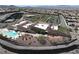 Aerial view of the community center with tennis courts and a pool at 2183 Waterton Rivers Dr, Henderson, NV 89044