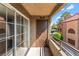 Balcony featuring sliding glass door, a view of the complex, and painted railing at 2200 S Fort Apache Rd # 2015, Las Vegas, NV 89117
