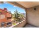 Private balcony with a view of community greenery at 2200 S Fort Apache Rd # 2015, Las Vegas, NV 89117