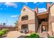 Multi-level condo with well-kept grounds, inviting stairs, and balconies for outdoor enjoyment at 2200 S Fort Apache Rd # 2015, Las Vegas, NV 89117