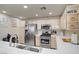 Eat in kitchen with tiled counter tops, stainless appliances, and recessed lighting at 2325 Windmill Pkwy # 321, Henderson, NV 89074