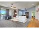 Cozy living room with high ceilings, balcony, and an adjacent dining area at 2325 Windmill Pkwy # 321, Henderson, NV 89074